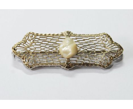 White gold openwork panel brooch with baroque pearl, '14k'.