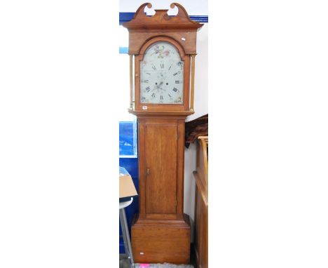 George III pine longcase clock with arched painted dial, 212cm high.