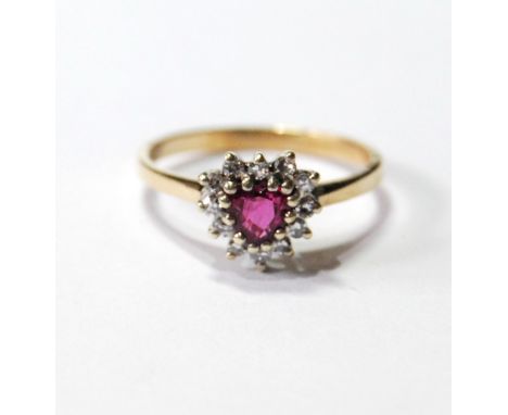Ruby and diamond cluster ring, in 9ct gold.