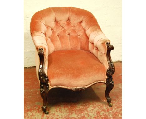 Victorian rosewood button-back armchair with serpentine seat, on cabriole legs, 75cm high.