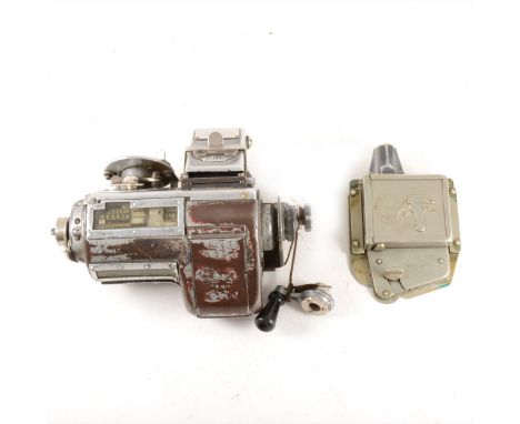 London Transport, a mechanical ticket machine together with a ticket cancelling bell punch a whistle and a leather pouch. (4)