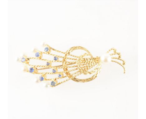 A sapphire and cultured pearl spray brooch, ten small sapphires individually claw set and seven 3.5mm cultured pearls peg set