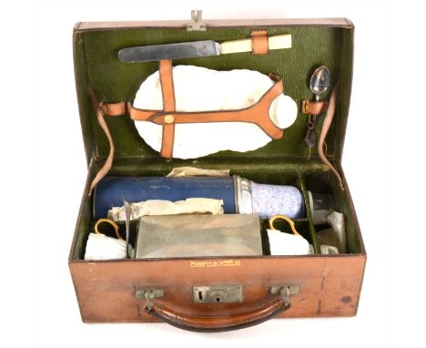 A vintage leather picnic set, Mappin &amp; Webb, part-fitted, width 31cm.