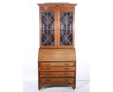 Edwardian inlaid mahogany bureau bookcase, moulded cornice, above astragal glazed doors, the base with a fall front, above fo