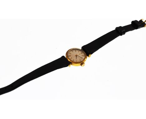  Omega Geneve gold tone cased ladies wristwatch Omega winding crown, champagne dial with gilt baton markers black leather str