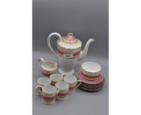 Slop bowl, milk, 6 cups and plates  and coffee set with 4 cups and saucers plus pot.  