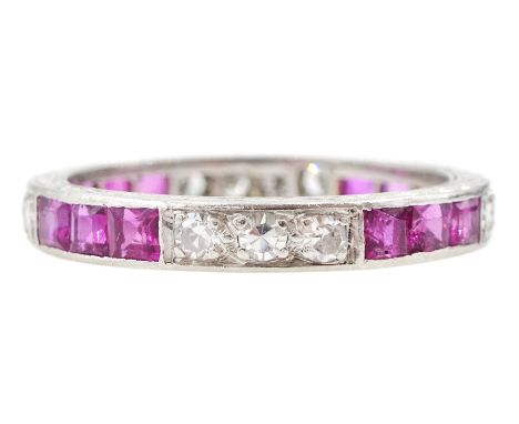 Platinum channel set, calibre cut ruby and diamond full eternity ringCondition Report:Approx 3.1gm, size M, depth = 3.25mm, t