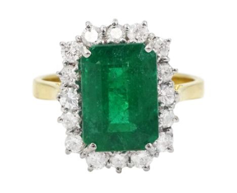 18ct gold emerald cut emerald and round brilliant cut diamond cluster ring, hallmarked, emerald approx 3.80 carat, total diam