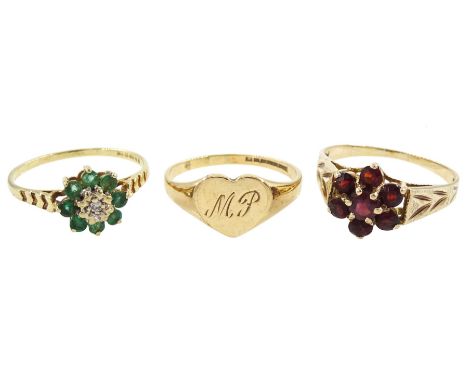 Three 9ct gold rings including emerald and diamond cluster, garnet cluster and a heart signet ring, with engraved initials 'M