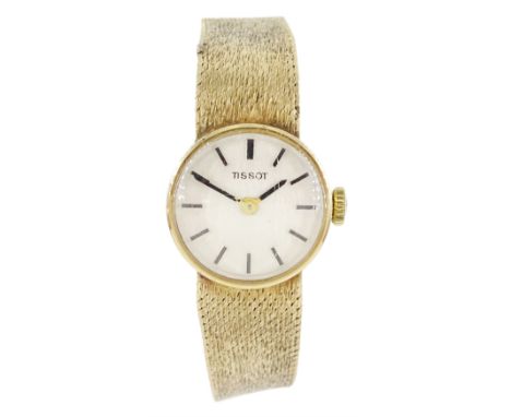 Tissot ladies 9ct gold manual wind wristwatch, silvered dial with baton hour markers, on integral 9ct gold bracelet, hallmark