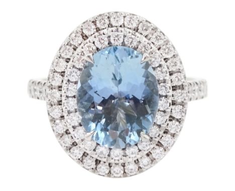 18ct white gold oval cut aquamarine and two row round brilliant cut diamond ring, hallmarked, aquamarine approx 2.40 carat, t