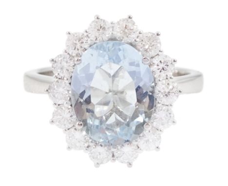 18ct white gold oval cut aquamarine and round brilliant cut diamond cluster ring, hallmarked, aquamarine approx 2.55 carat, t