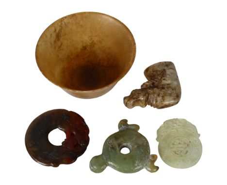 A group of Oriental jade and soapstone pendants, small tea bowl etc (5) 