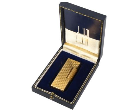 A gold plated Dunhill lighter in original box 
