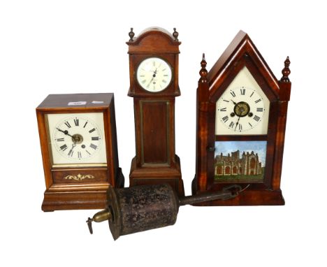 A longcase style clock by Evans of Uckfield, 40cm, a lancet clock with church illustration, and another, and a spit roasting 