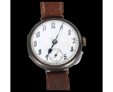 An early 20th century silver-cased wristwatch with white enamel dial, and a 19th century black lacquered snuffbox 