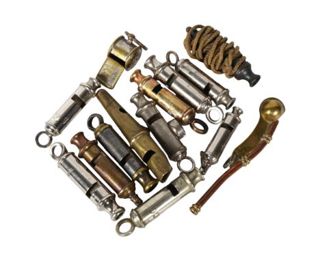 A collection of Vintage chrome plate whistles, including Emca Boy Scouts, Aldershot Stores, a Boy Scout's with attached compa