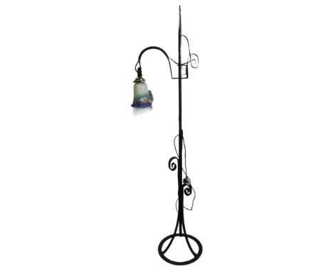 A wrought-iron standard lamp with 1 fitted glass shade, H154cm, and an accompanying 3-branch brass chandelier with similarly 