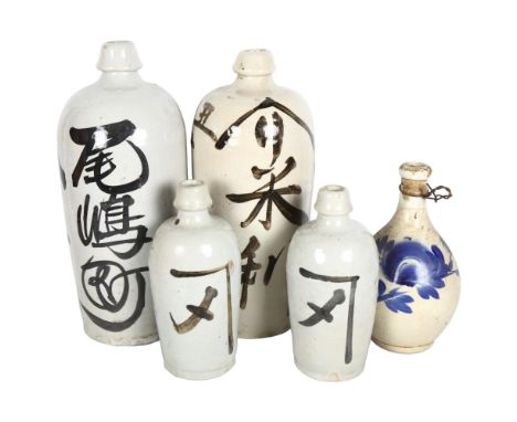 A group of 5 Tokkuri ceramic Sake bottles, largest height 37cm 