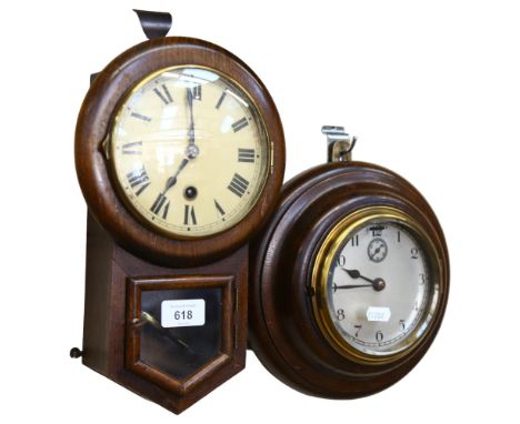 An oak-framed bulkhead clock, 21cm, and a small Vintage German oak-cased drop-dial wall clock, with key and pendulum 
