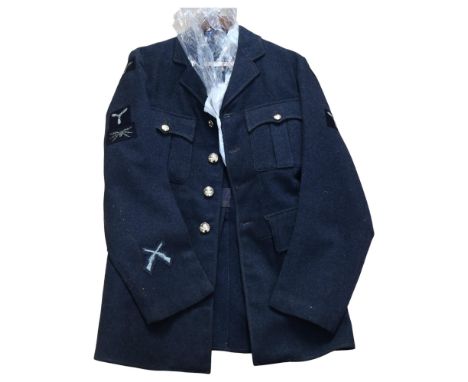 A Vintage RAF wool uniform jacket with sleeve badges, size 17 