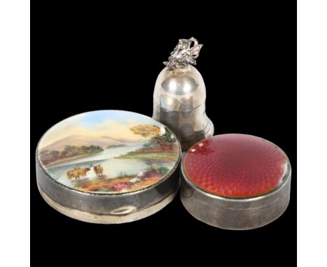 A circular silver pillbox with enamel decorated lid, depicting a Highland river view (lacking interior), a small modern circu