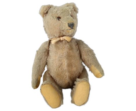 A Vintage straw-filled teddy bear, L30cmBear has suffered from areas of allover hair loss, and these areas are showing the he