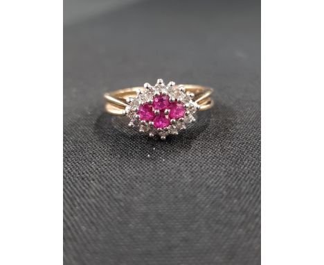9 CARAT GOLD RUBY AND DIAMOND CLUSTER RING 