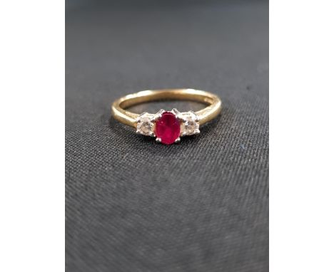 18 CARAT RUBY AND 2 STONE DIAMOND RING 