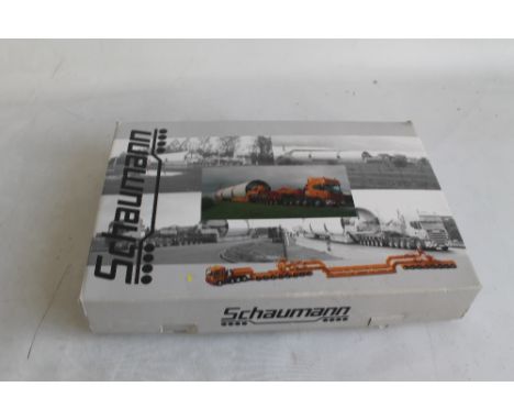 A BOXED CORGI "SCHAUMANN" HEAVY HAULAGE TRACTOR, with Goldhofer Lift Lever 16 Axle Bridge Trailer