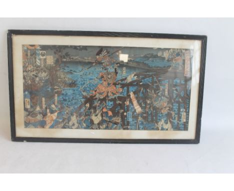 AN ANTIQUE JAPANESE COLOURED WOOD BLOCK PRINT, of a battle scene with numerous Samurai Warriors, and various seal marks