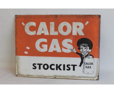 A VINTAGE "CALOR GAS STOCKIST" ENAMEL SIGN, 61 cm x 45 cm