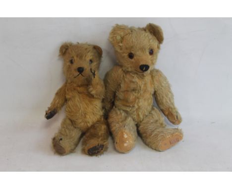 A CHAD VALLEY JOINTED TEDDY BEAR WITH BUTTON TO EAR, together with one other small jointed bear