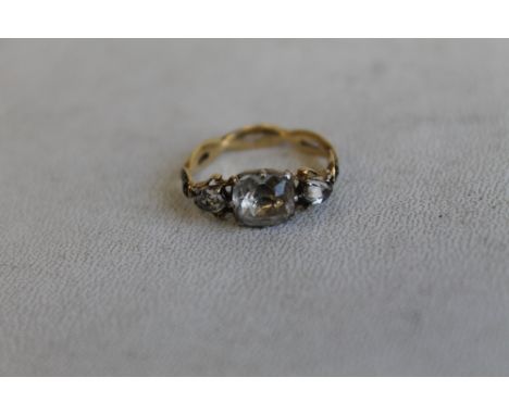A GEORGE II PERIOD YELLOW METAL AND ENAMEL PASTE SET MOURNING RING, dated 1734, ring size H, weight 2.54 g