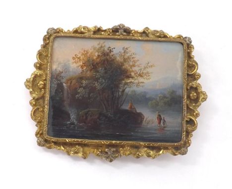 19th Century School - miniature portrait brooch painted on mother of pearl, depicting a figure in a country river landscape, 