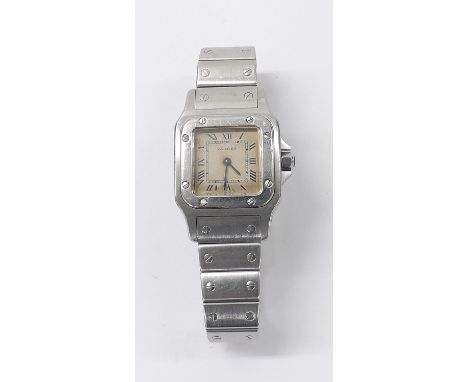Cartier Santos stainless steel lady's bracelet watch, case nos. 9057930 00628, square silvered dial with Roman numerals, inne