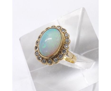 18ct cabouchon opal and diamond cluster ring, 10mm x 8mm, 5.5gm, ring size L