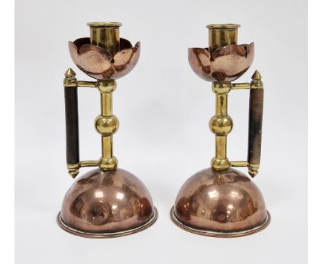 Pair of Arts and Crafts copper and brass candlesticks&nbsp;in the manner of Christopher Dresser for Benham and Froud, with fo