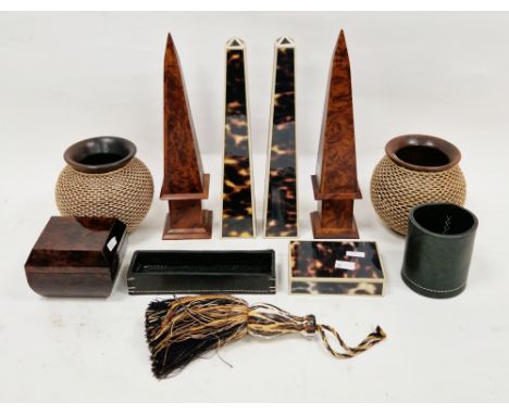 Collection of simulated tortoiseshell and burrwood desk obelisks, two tribal-style rattan covered turned wooden globular vase