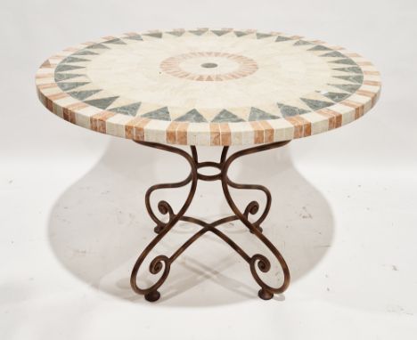 Modern circular conservatory table with marble and stone inlaid effect top, on a scrolling metal base, 74cm high x 106cm diam