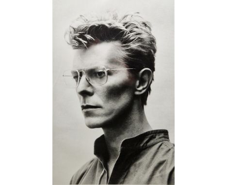 After Helmut Newton (1920-2004) Photographic print Framed portrait of David Bowie, a crop of the original 1982 image, 49.5cm 