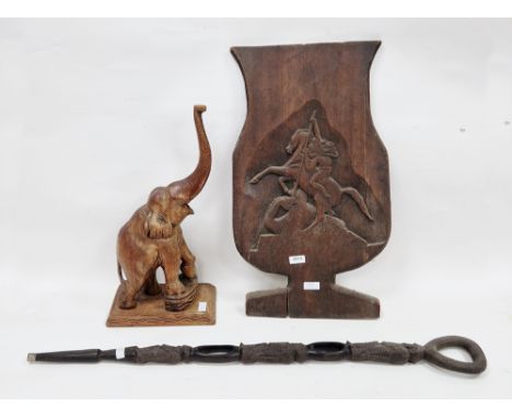 African tribal ebony carved walking stick with loop handle and the shaft carved in the form of the three monkeys ' See no evi