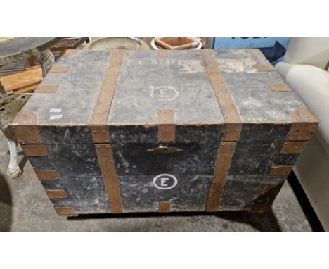 Large iron bound wooden travelling trunk, the hinged lid opening to a metal lining, with carrying handles, 53cm high x 94cm w