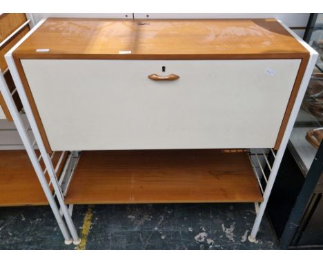 Two Mid-century Ladderax shelving units, comprising a two section unit with lockable fall front bureau and a single shelf and