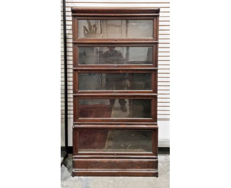 Late 19th / early 20th century oak five-section stacking bookcase in the manner of Globe Wernicke, each section with clear gl