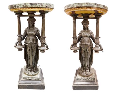 Pair of French marble and bronze gueridons, the circular green marble tops with bronze supports cast as classical ladies each