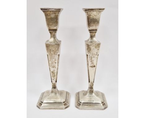 Pair of silver candlesticks, Birmingham 1960, maker Sanders &amp; MacKenzie, of square baluster form on stepped square feet, 