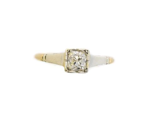 A 9ct gold diamond solitaire ring, the old cut diamond weighing approx. 0.30ct within a square setting and tapered shoulders,