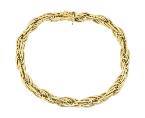 An 18ct gold bracelet, the fancy link chain with partially concealed push piece clasp, hallmarks for London, length 19.8cm, g