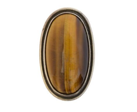 A Georg Jensen tiger's eye ring, no. 46E, the oval tiger's eye cabochon within a grooved surround, maker's marks for Georg Je